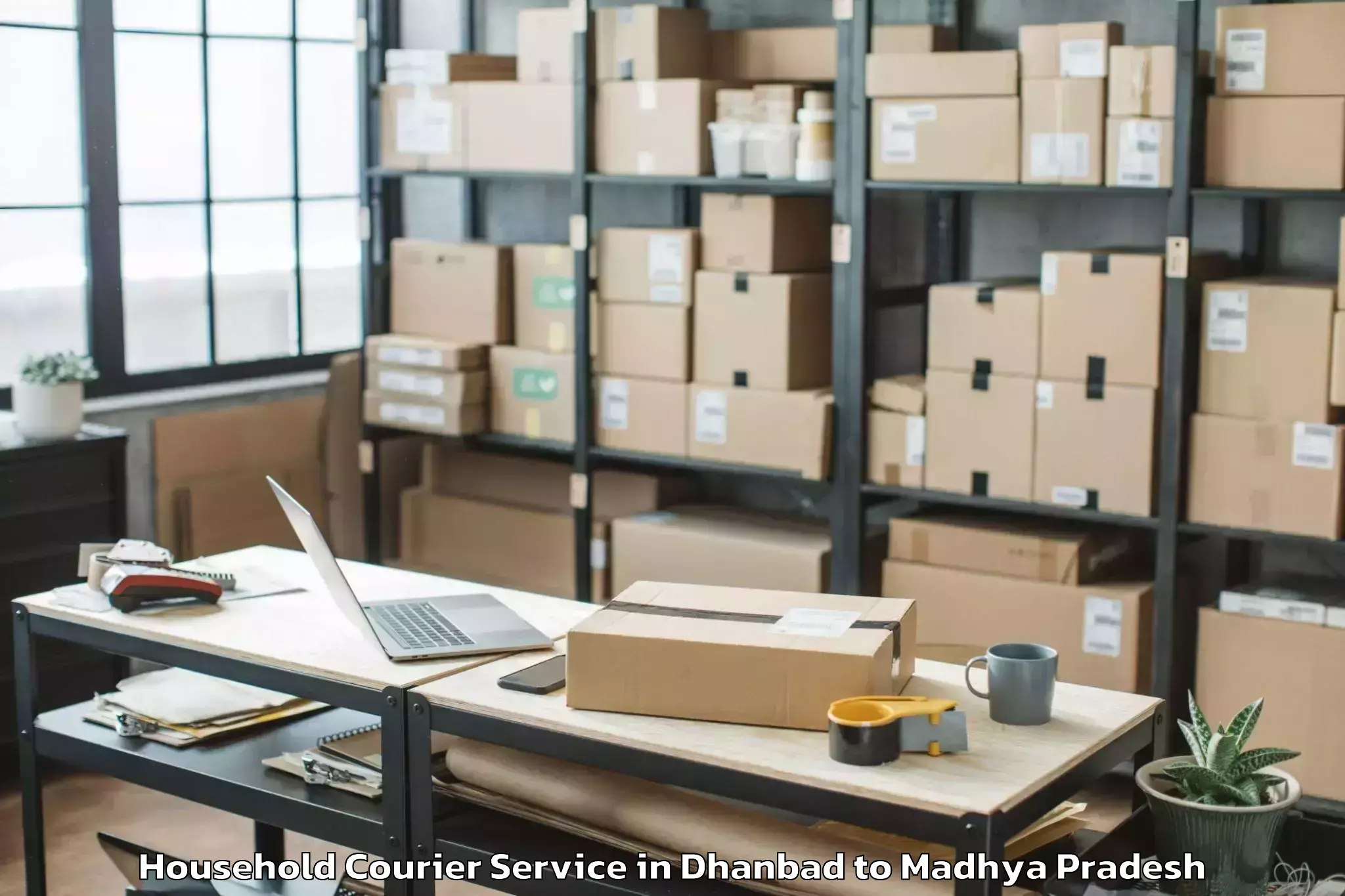 Reliable Dhanbad to Maksi Household Courier